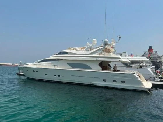 a large white yacht in the water aboard SOFIA Yacht for Sale