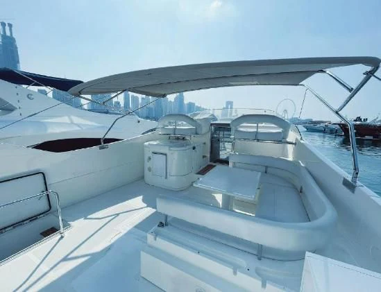 a boat with a large machine on the deck aboard SOFIA Yacht for Sale