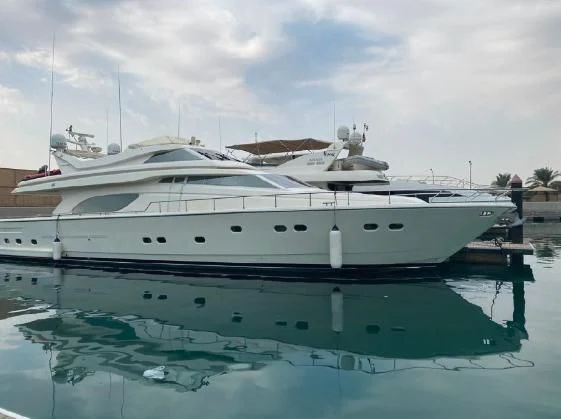 a white yacht in the water aboard SOFIA Yacht for Sale