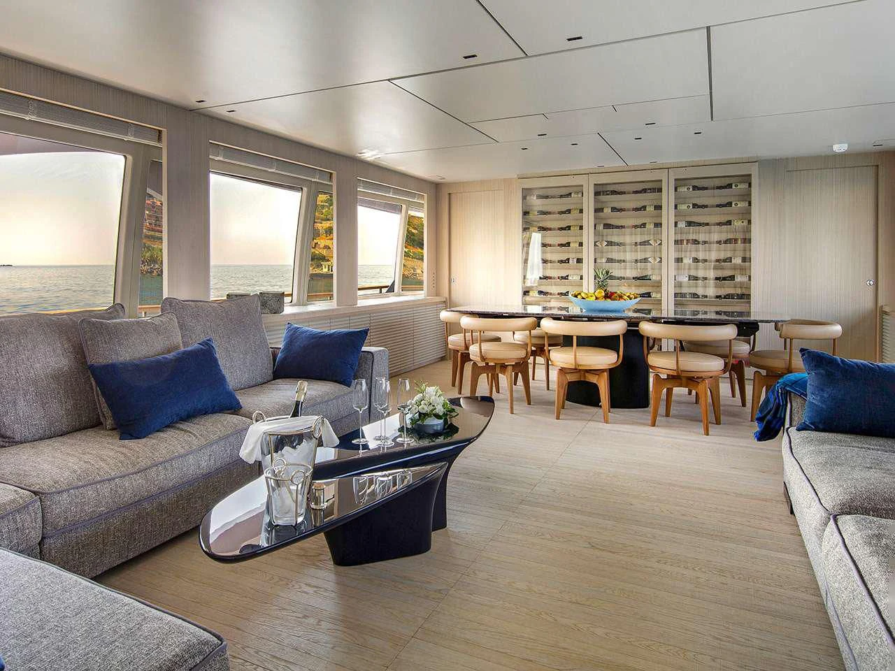 a living room with a couch and a table aboard ANGIOLA Yacht for Sale