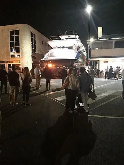 a group of people standing outside a bus aboard ANGIOLA Yacht for Sale