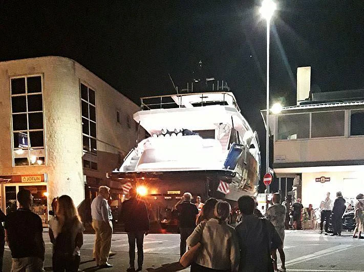 a group of people standing outside a bus aboard ANGIOLA Yacht for Sale