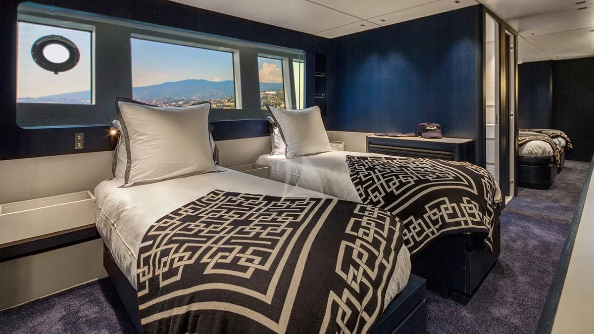 a room with two beds aboard ANGIOLA Yacht for Sale