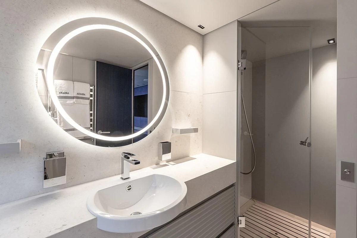 a bathroom with a large mirror aboard ANGIOLA Yacht for Sale