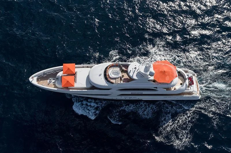 a white and orange boat on the water aboard ARTISA Yacht for Sale