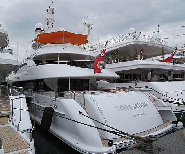 a few white boats docked aboard ARTISA Yacht for Sale