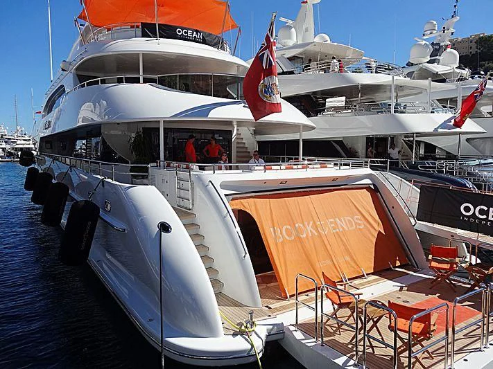 a boat with flags on it aboard ARTISA Yacht for Sale