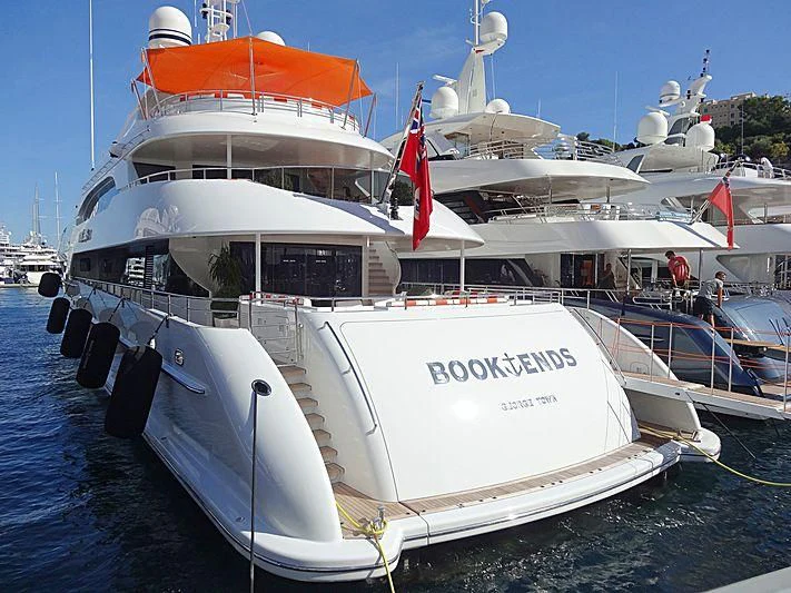 a large white boat with a red canopy on it aboard ARTISA Yacht for Sale