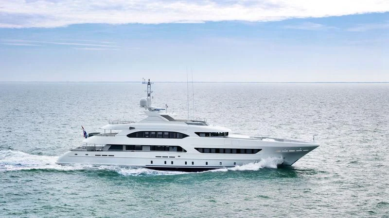 a white yacht in the ocean aboard ARTISA Yacht for Sale