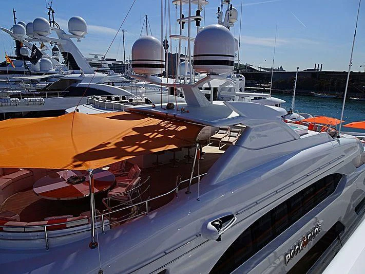 a boat with a large orange and white boat on it aboard ARTISA Yacht for Sale