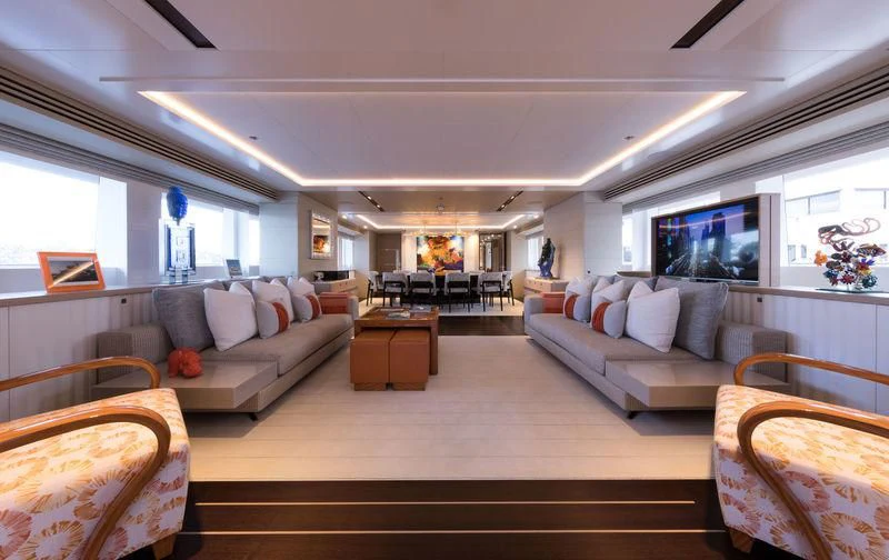 a living room with a large window aboard ARTISA Yacht for Sale