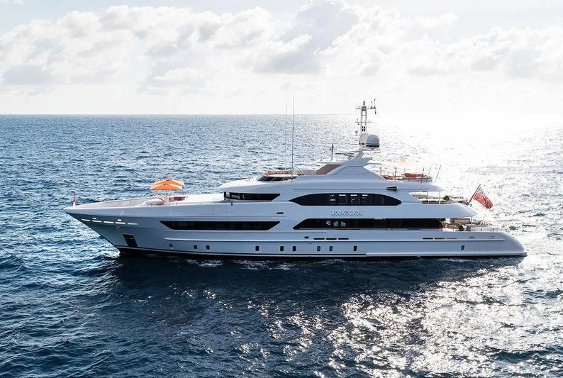 a white yacht in the ocean aboard ARTISA Yacht for Sale
