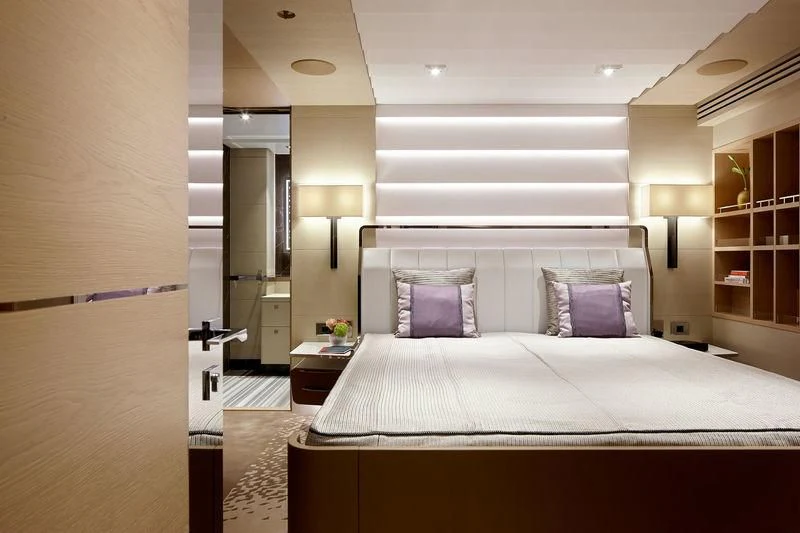 a bed in a room aboard ARTISA Yacht for Sale