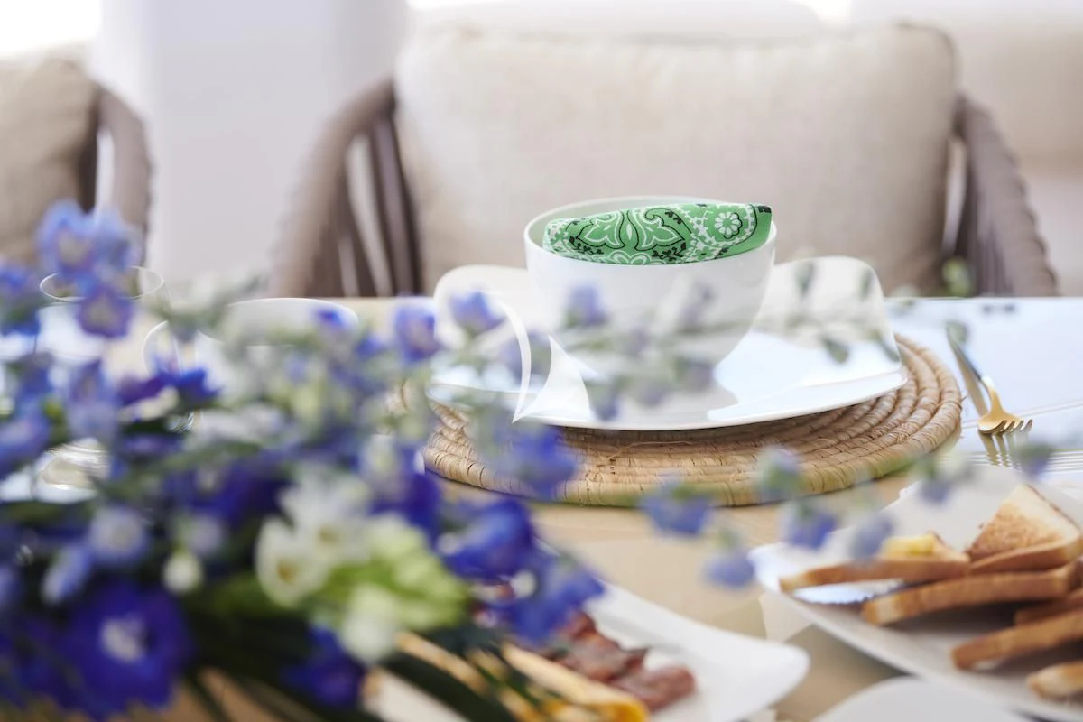 a tea cup on a table aboard PROMETHEUS I Yacht for Charter
