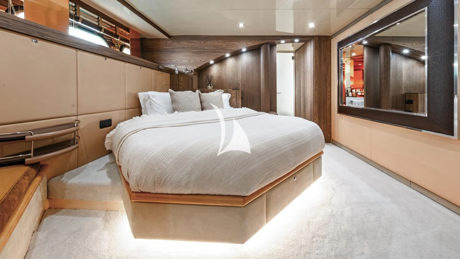 a large bed in a room aboard PROMETHEUS I Yacht for Charter