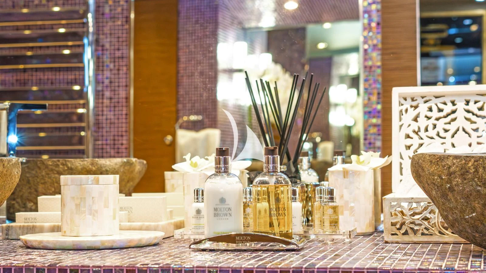 a table with food and bottles aboard PROMETHEUS I Yacht for Charter