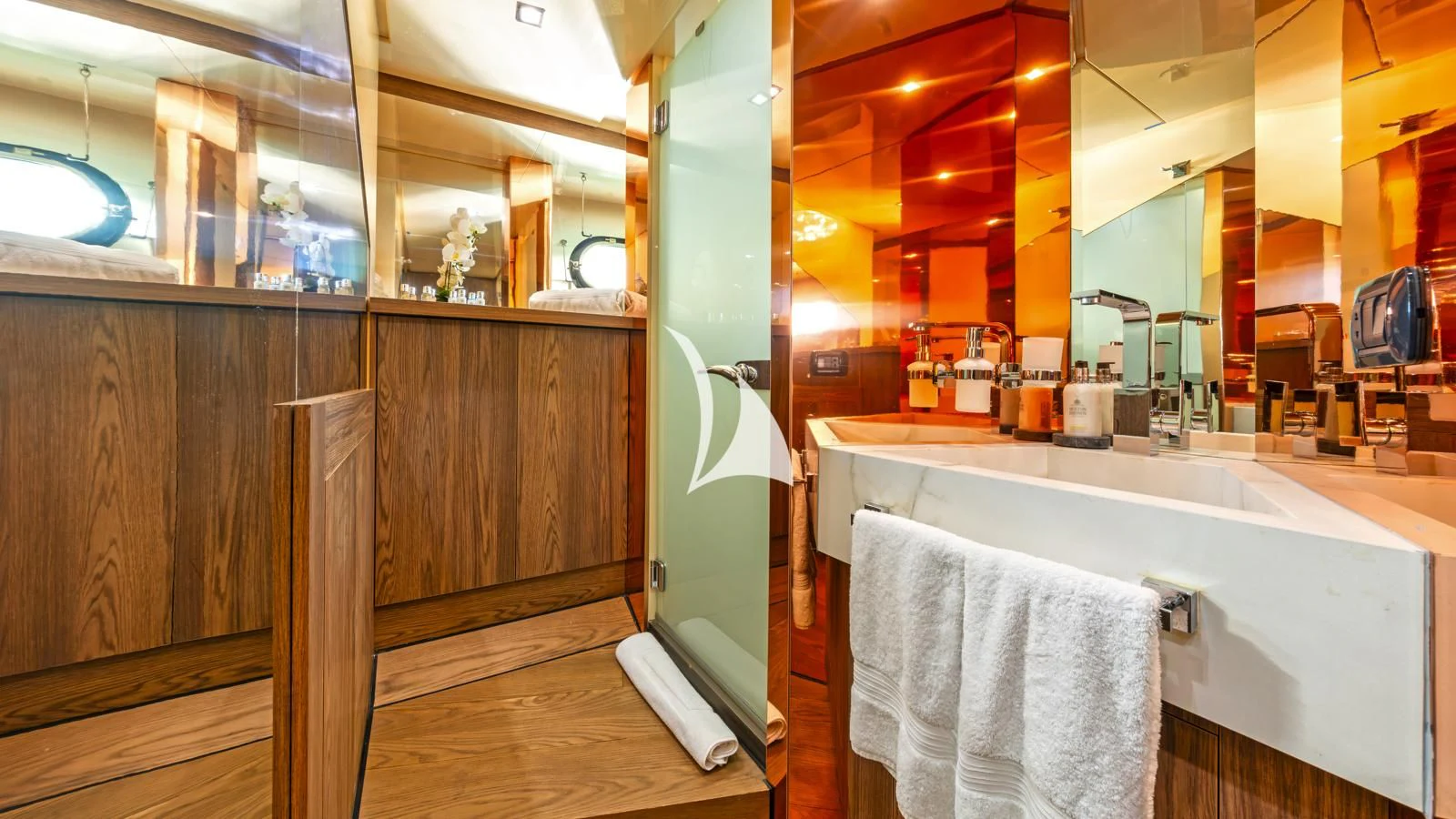 a bathroom with a large tub aboard PROMETHEUS I Yacht for Charter