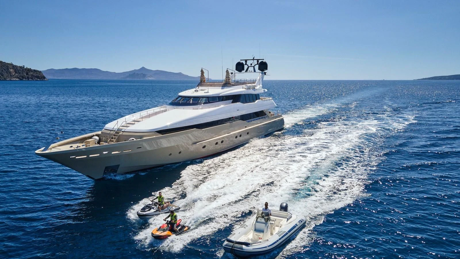 a boat carrying a boat aboard PROMETHEUS I Yacht for Charter
