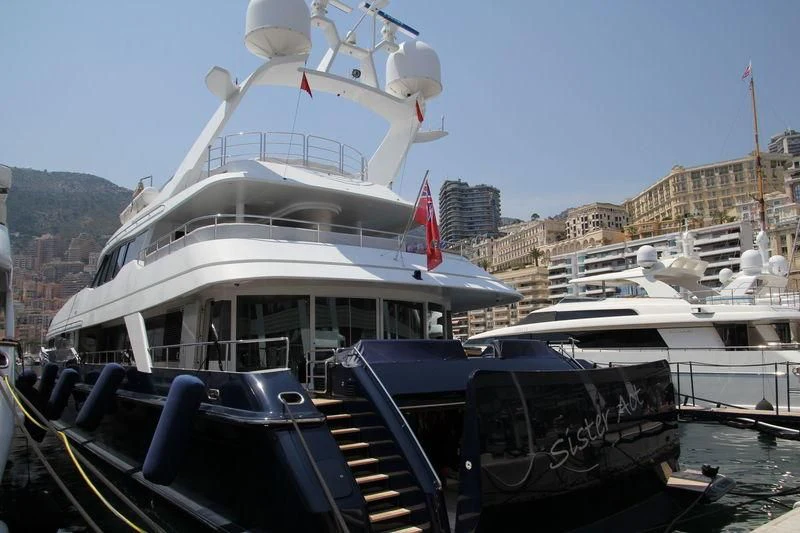 a boat docked in a harbor aboard PROMETHEUS I Yacht for Charter