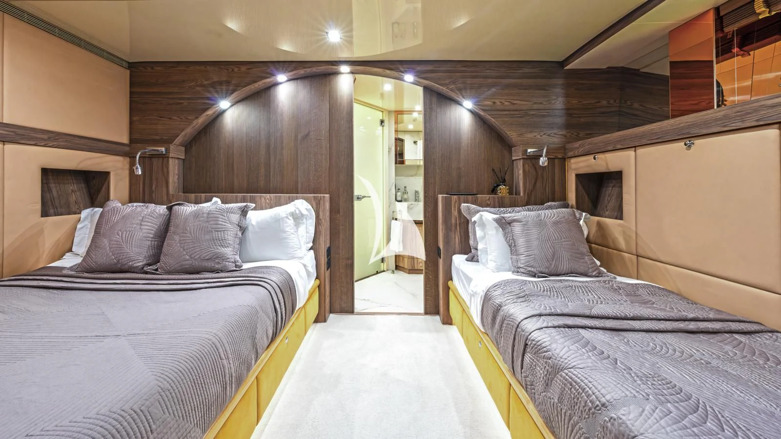 a couple of beds in a room aboard PROMETHEUS I Yacht for Charter