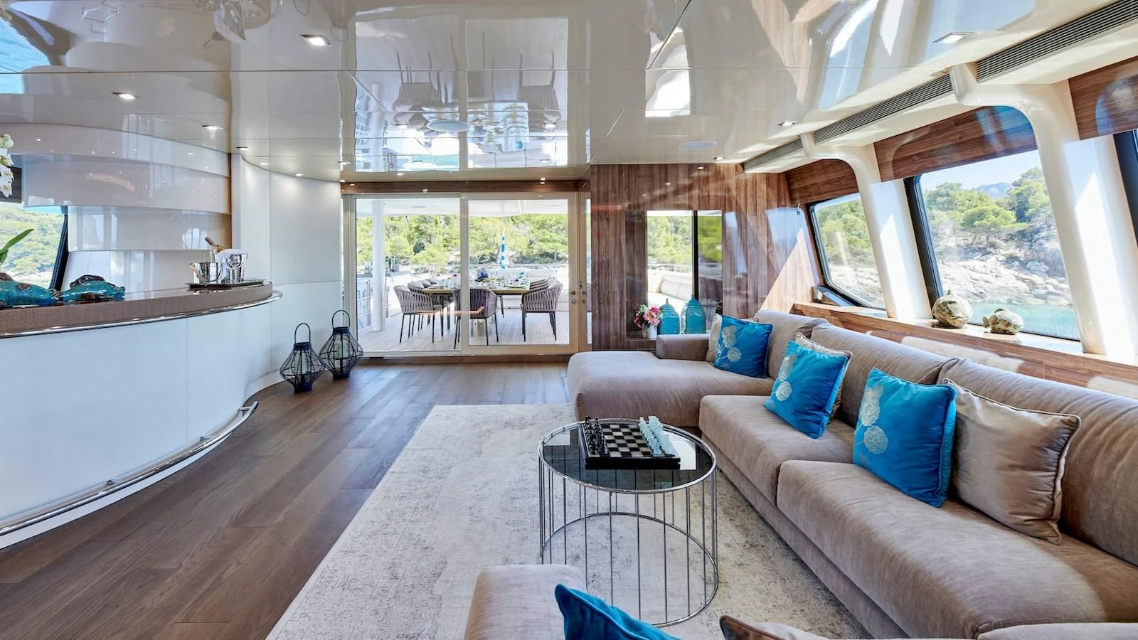 a living room with a couch and a table aboard PROMETHEUS I Yacht for Charter