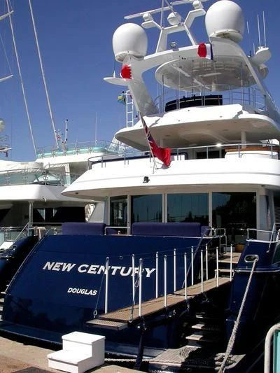 a boat docked at a pier aboard PROMETHEUS I Yacht for Charter