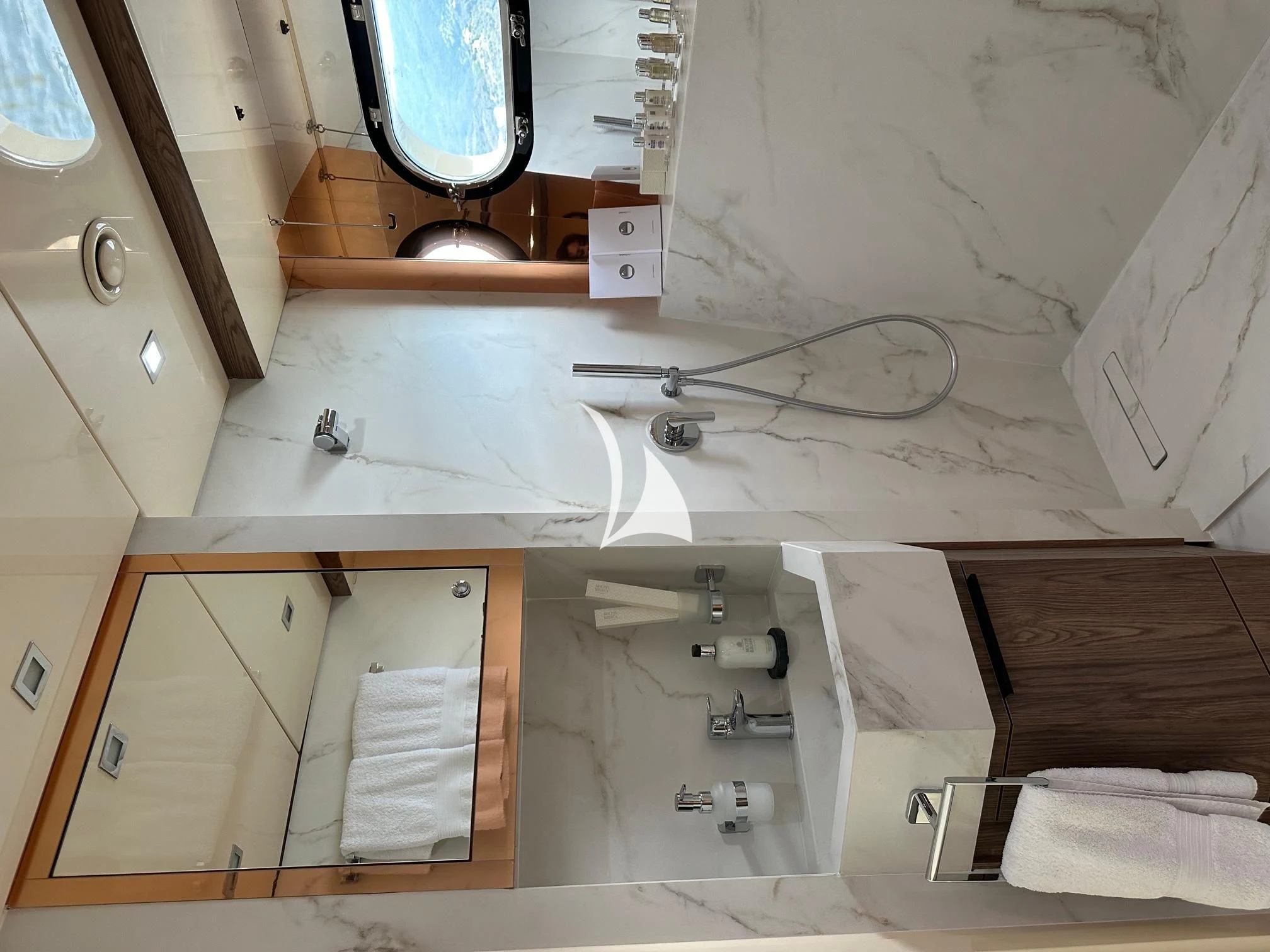 a room with a sink and a mirror aboard PROMETHEUS I Yacht for Charter
