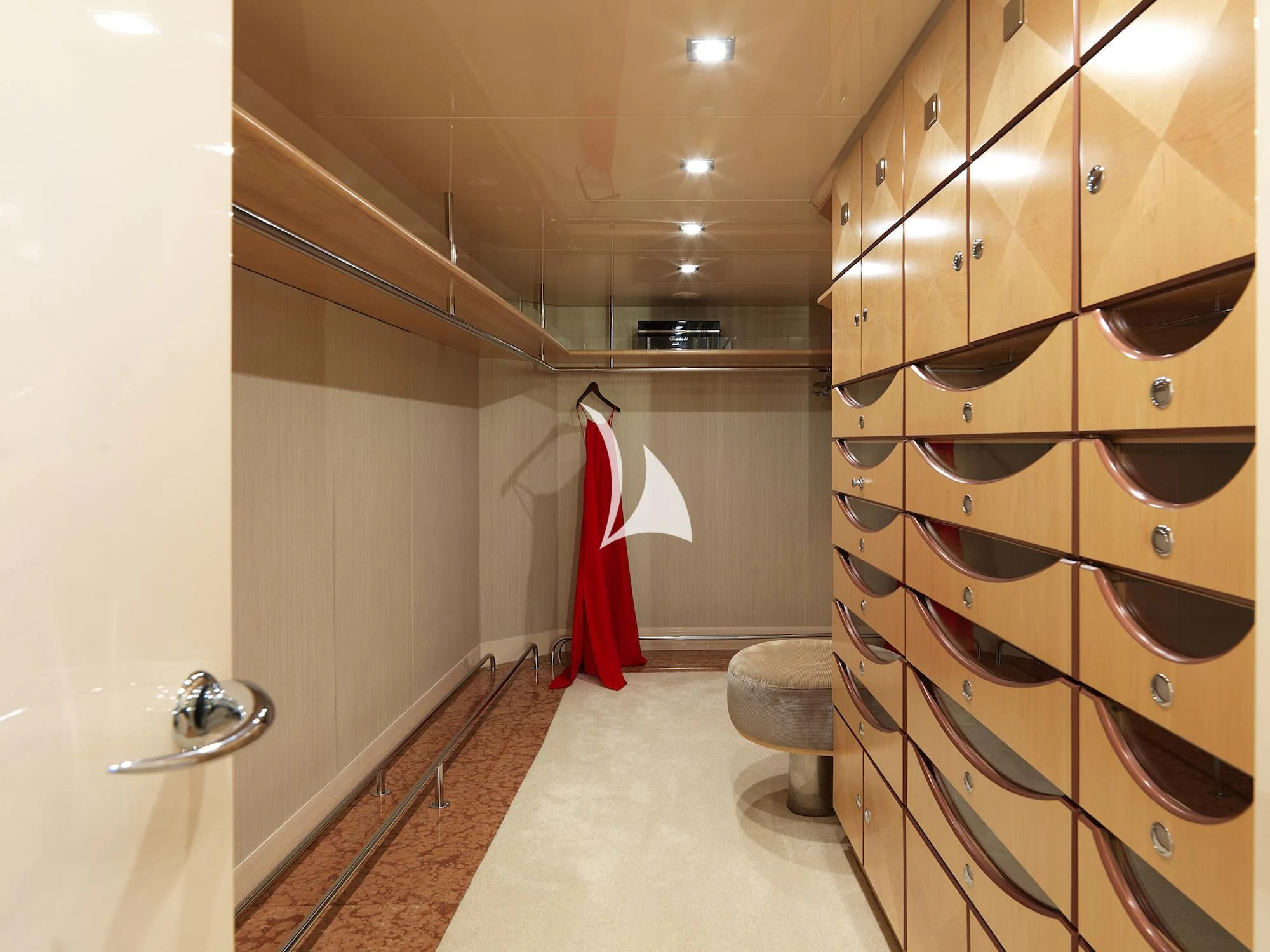 a bathroom with a red and white towel from the ceiling aboard PROMETHEUS I Yacht for Charter