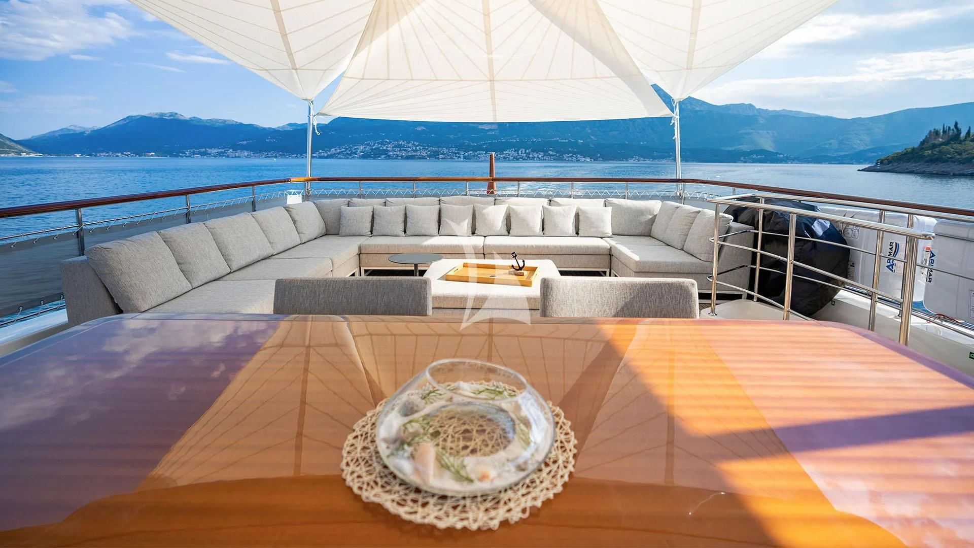 a large living room with a large body of water aboard VALENTINA II Yacht for Sale