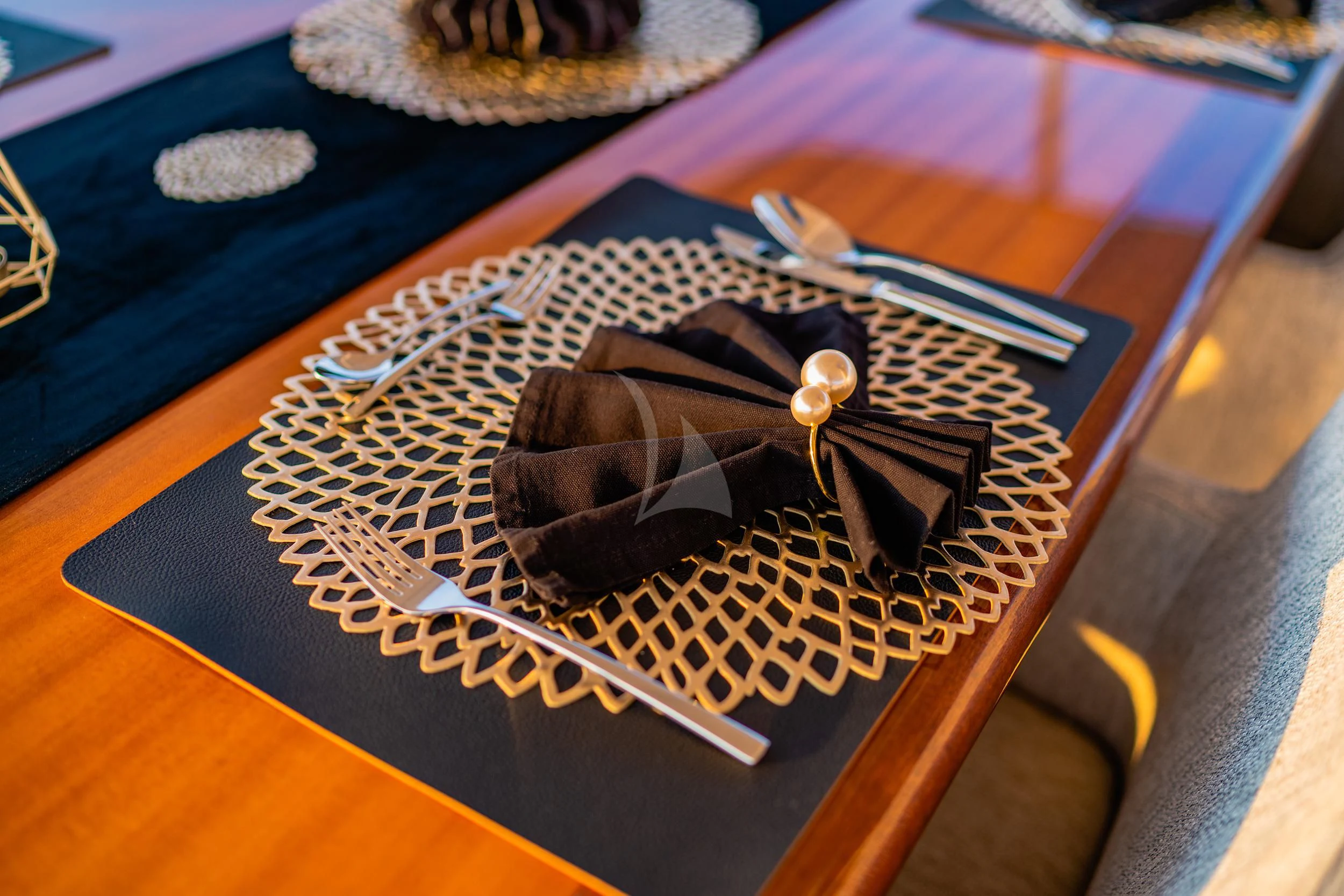 a purse on a table aboard VALENTINA II Yacht for Sale