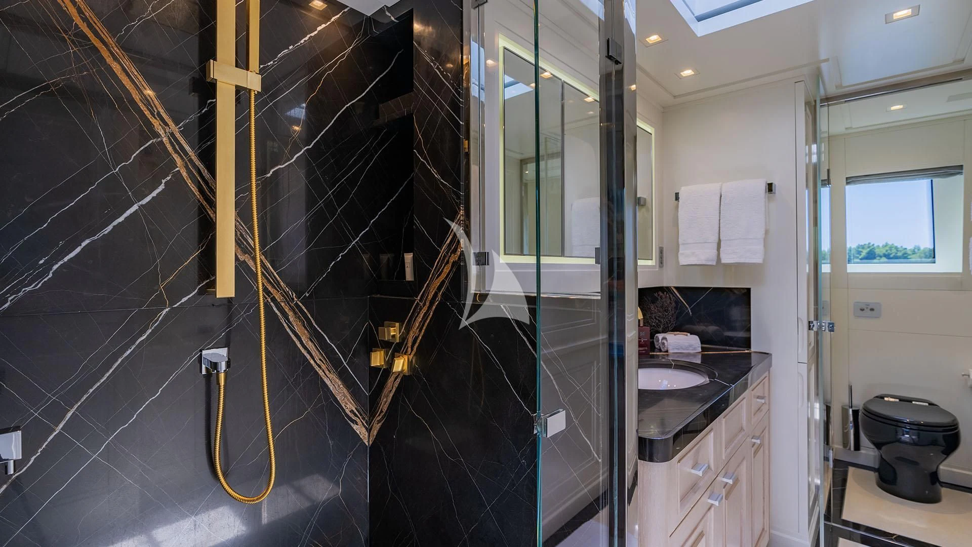 a bathroom with a shower unit aboard VALENTINA II Yacht for Sale