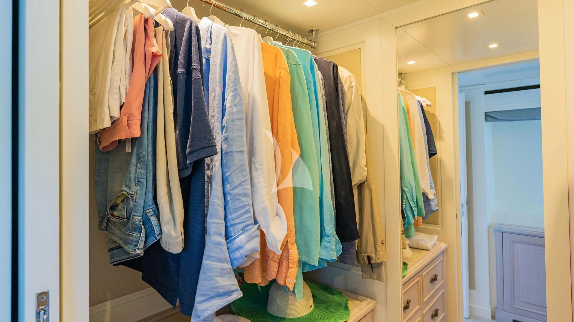 a closet full of clothes aboard VALENTINA II Yacht for Sale