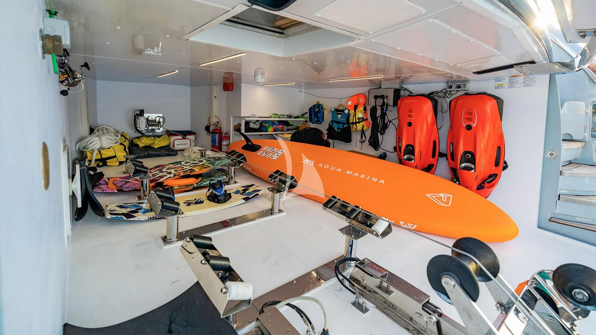 a room with a large orange and white robot aboard VALENTINA II Yacht for Sale