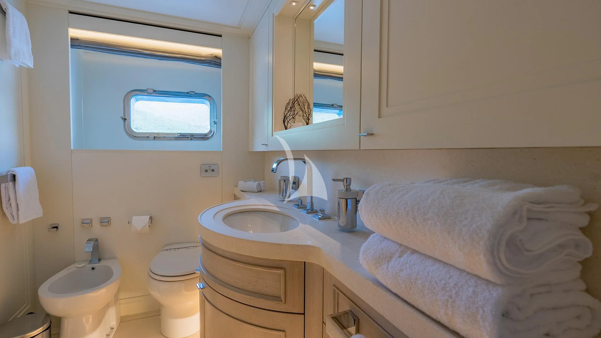 a bathroom with a sink and toilet aboard VALENTINA II Yacht for Sale
