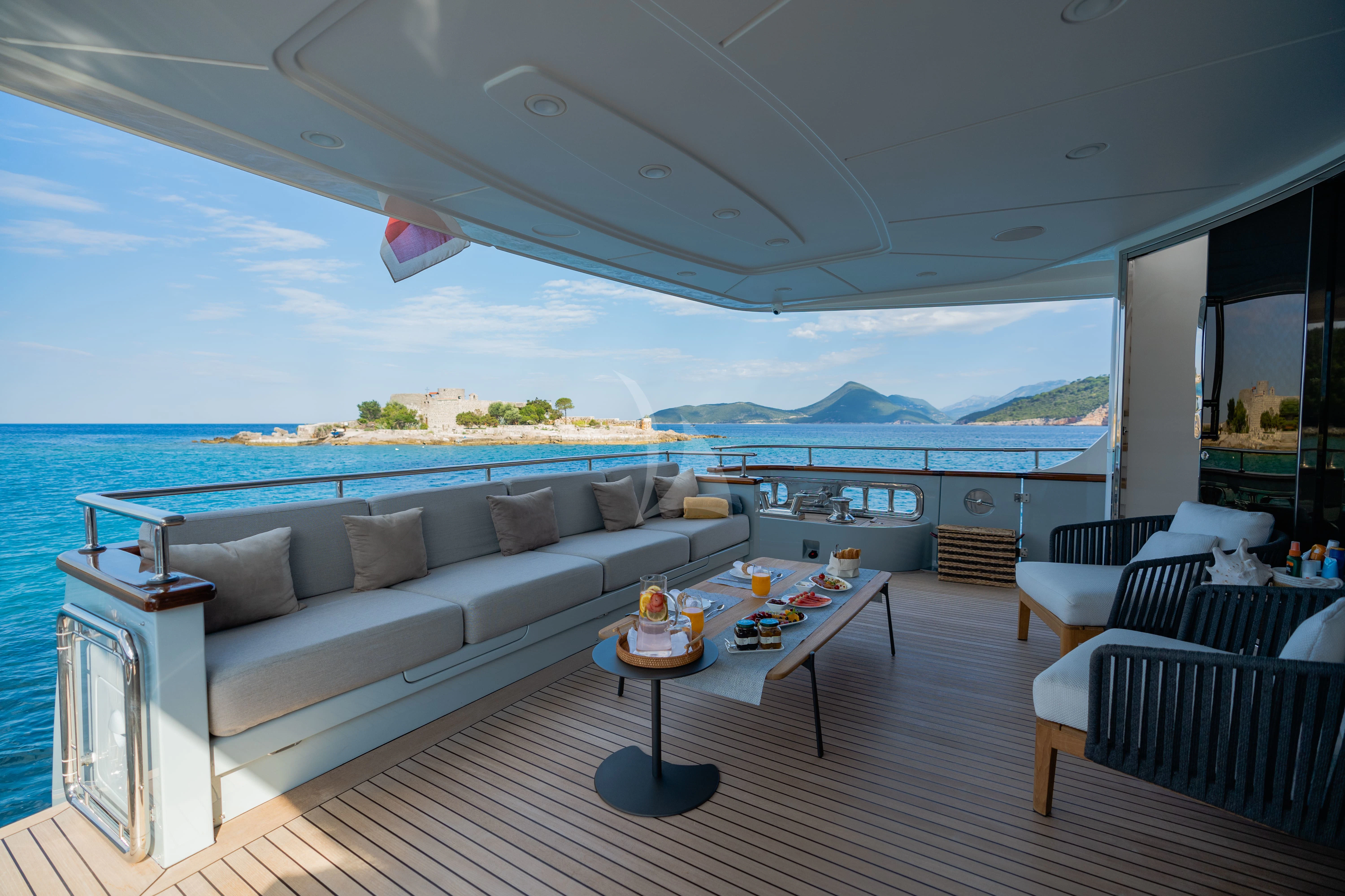 a living room with a large body of water aboard VALENTINA II Yacht for Sale