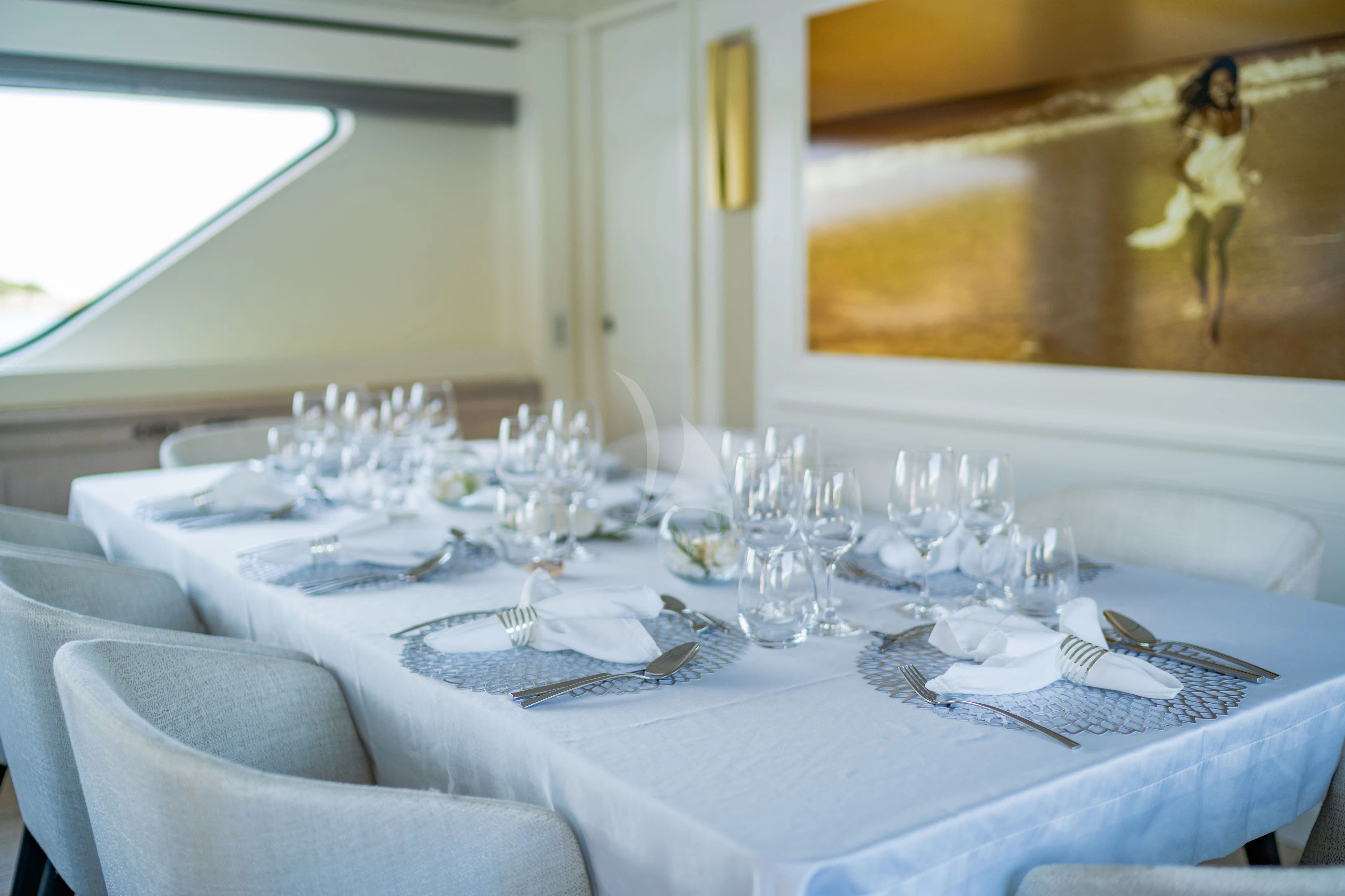 a table set for a dinner aboard VALENTINA II Yacht for Sale