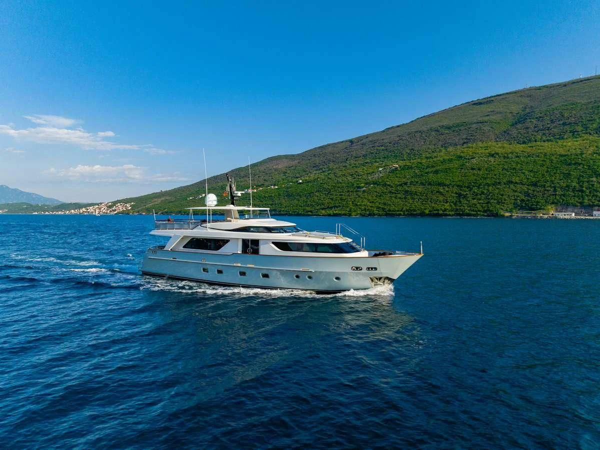 a white boat on water aboard VALENTINA II Yacht for Sale