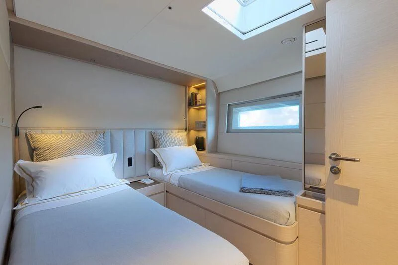 a room with two beds aboard LIBERTY SQUARED Yacht for Sale