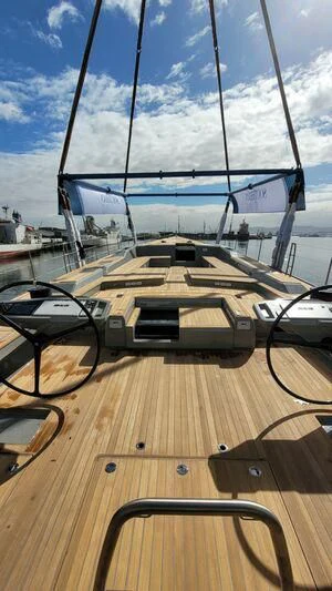 a large ship in a harbor aboard LIBERTY SQUARED Yacht for Sale