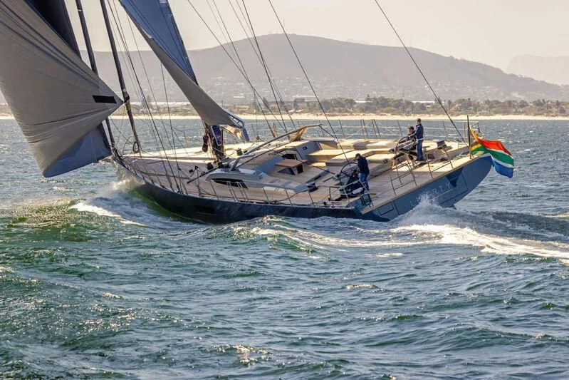 a group of people sailing on a boat in the water aboard LIBERTY SQUARED Yacht for Sale