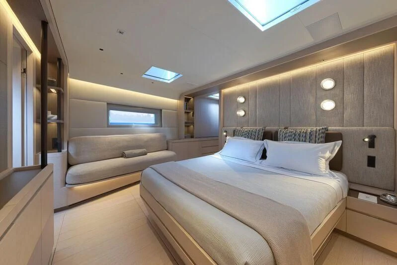a bed in a room aboard LIBERTY SQUARED Yacht for Sale
