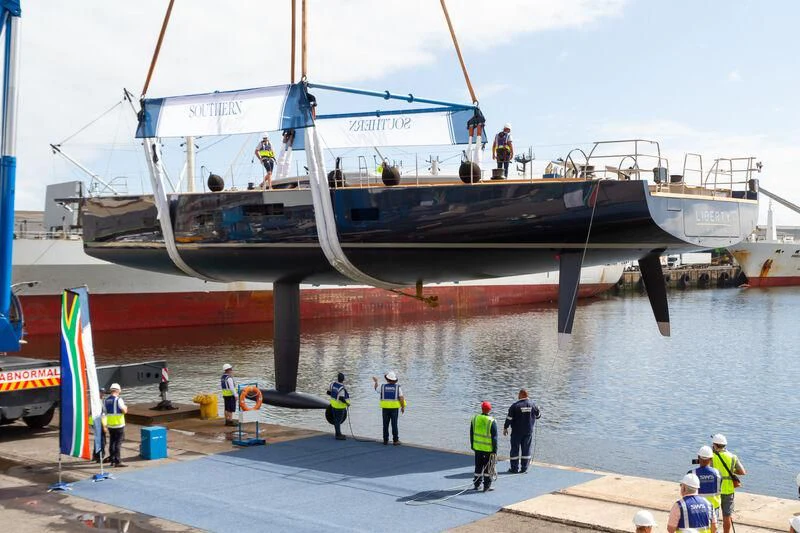a large ship docked at a port aboard LIBERTY SQUARED Yacht for Sale