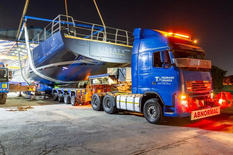 a truck towing a boat aboard LIBERTY SQUARED Yacht for Sale