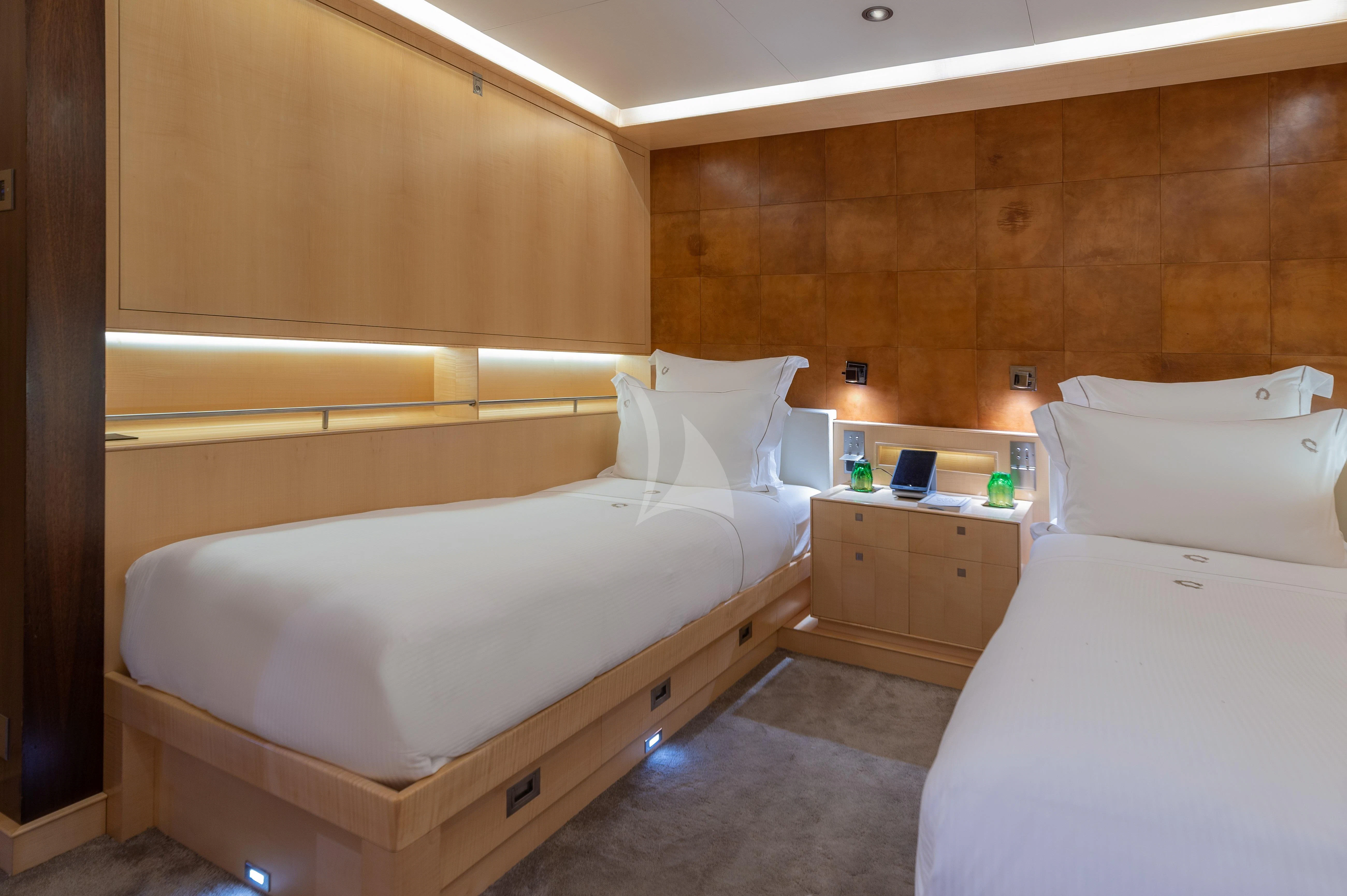 a room with two beds aboard VICTORIA A Yacht for Charter