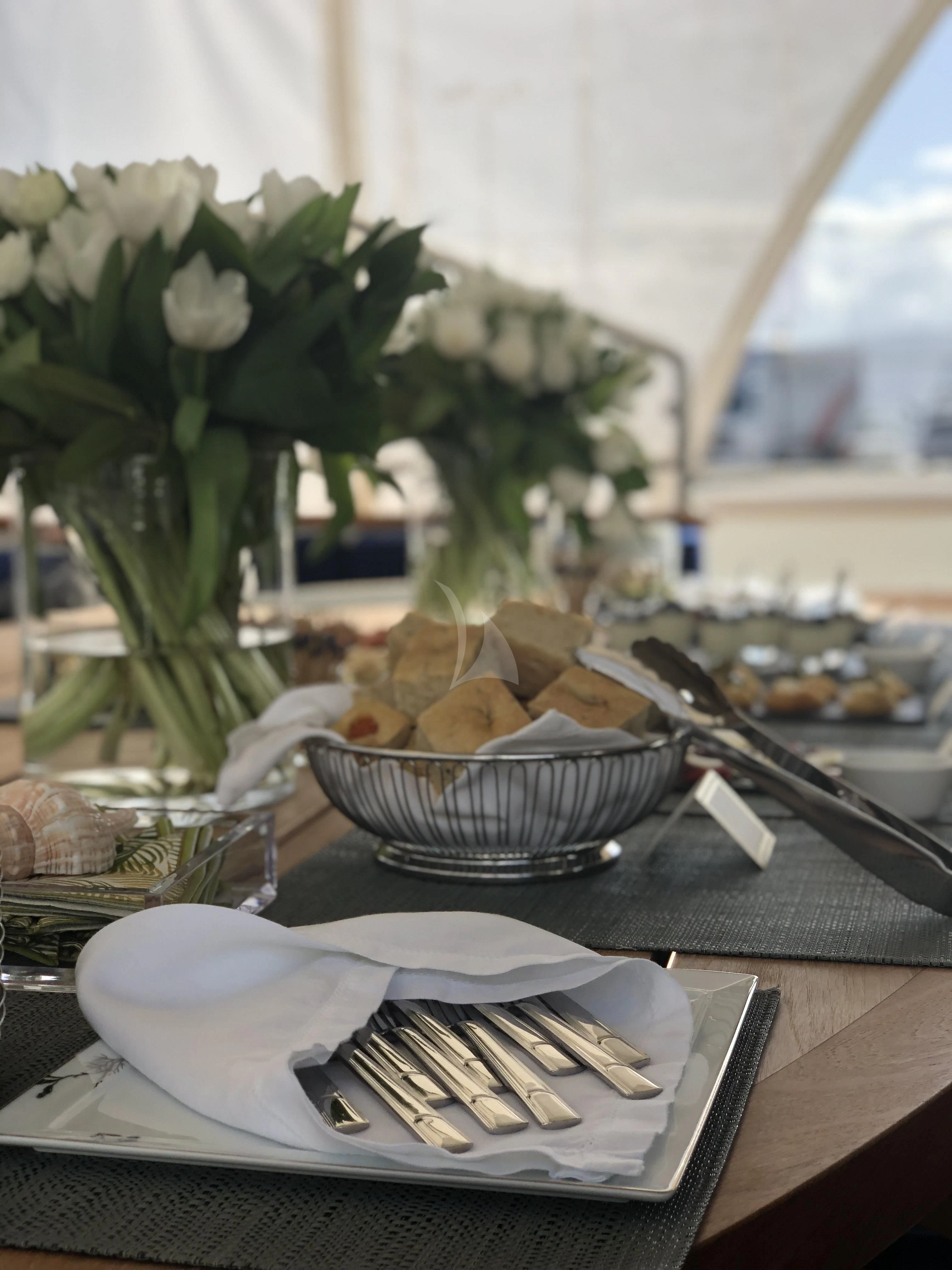 a table with food on it aboard VICTORIA A Yacht for Charter