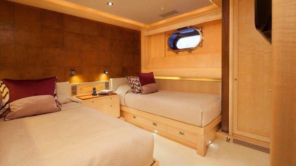 a room with two beds aboard VICTORIA A Yacht for Charter