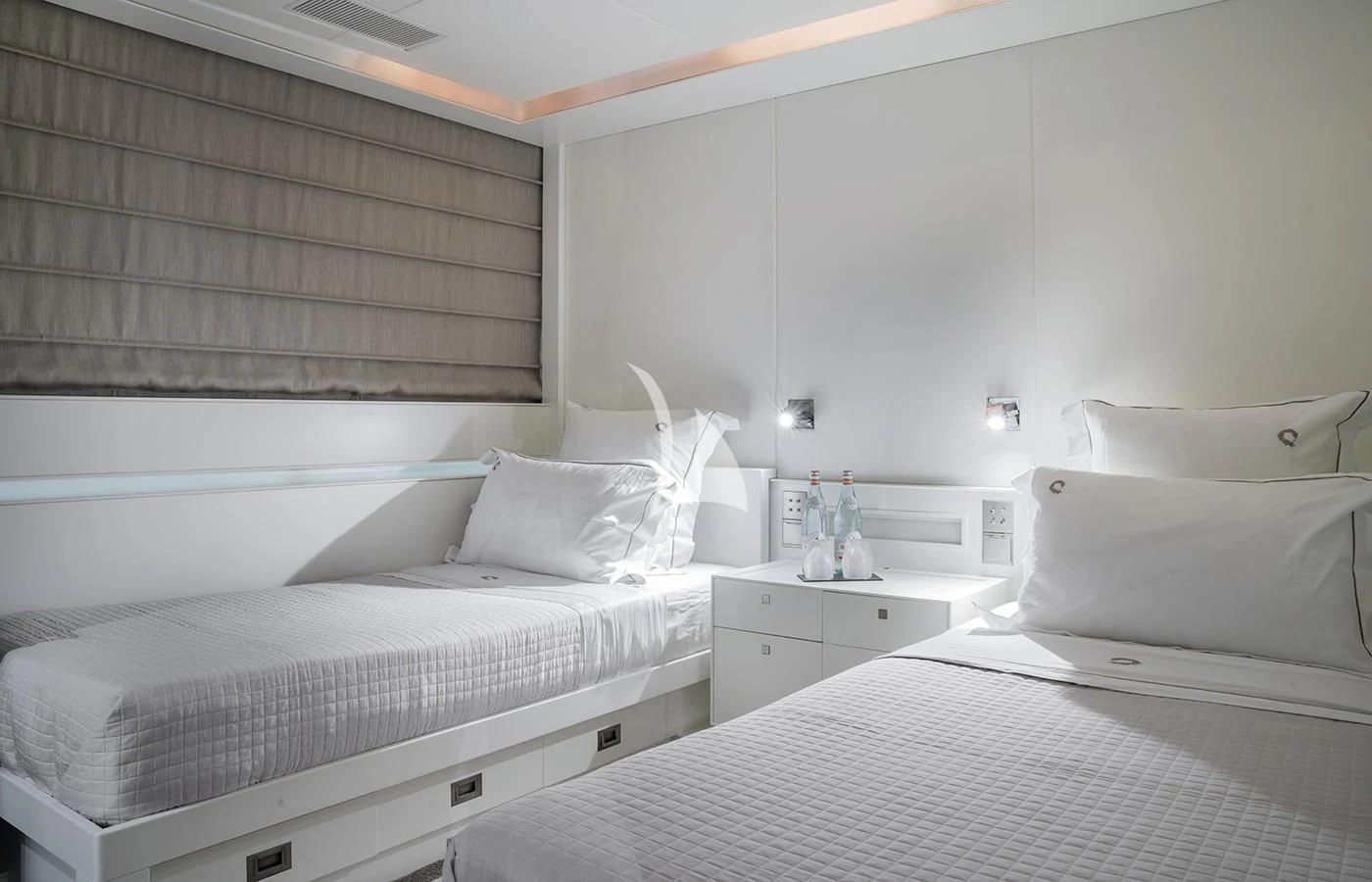 a couple of beds in a room aboard VICTORIA A Yacht for Charter