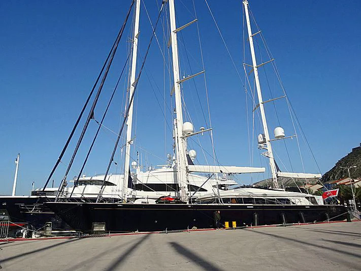 a large boat on a dock aboard VICTORIA A Yacht for Charter