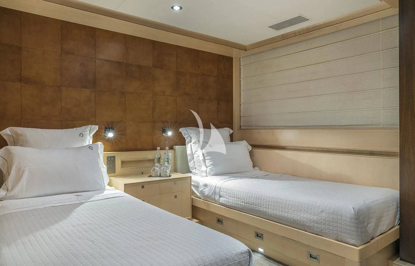a couple of beds in a hotel room aboard VICTORIA A Yacht for Charter