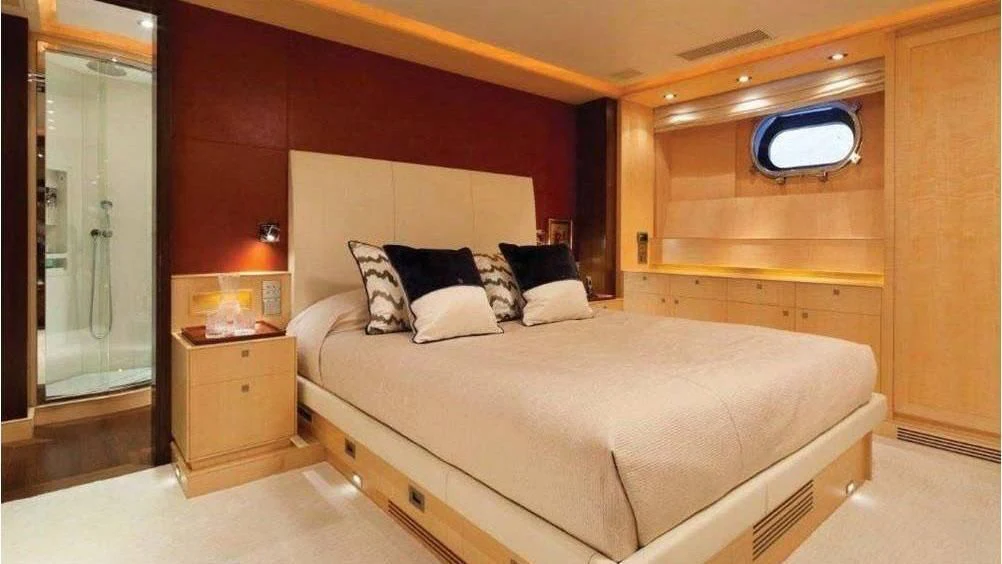 a bed in a room aboard VICTORIA A Yacht for Charter